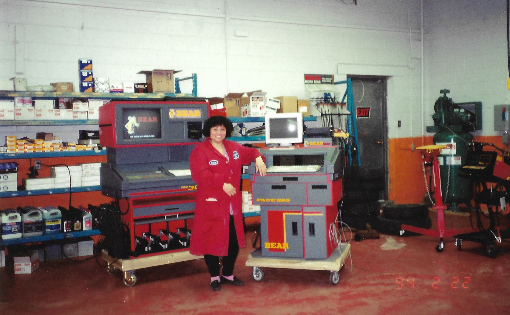 Mom standing next to a new set of tools in 1994.